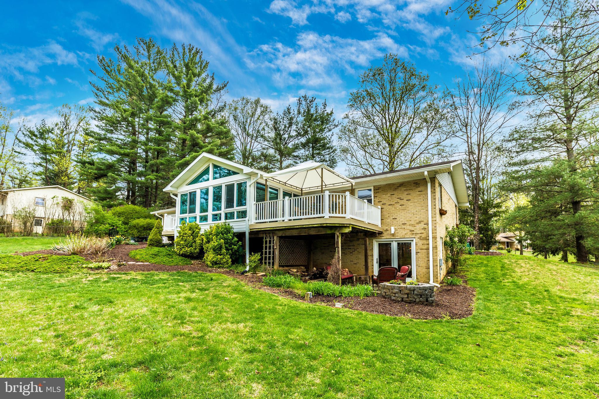 5506 Woodlyn Road Frederick, MD 21703 - Photo 44 of 51 a view of a house with a yard porch and sitting area