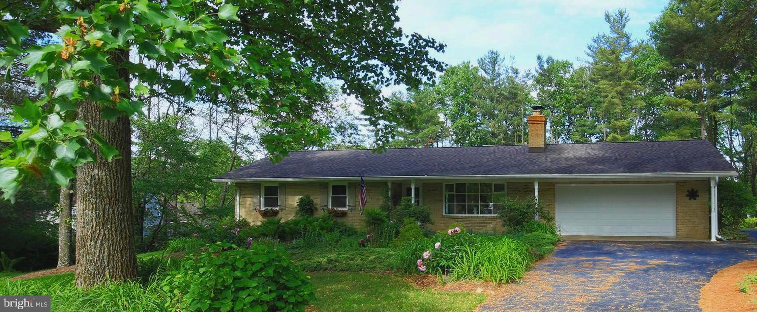 5506 Woodlyn Road Frederick, MD 21703 - Photo 51 of 51 a front view of a house with garden