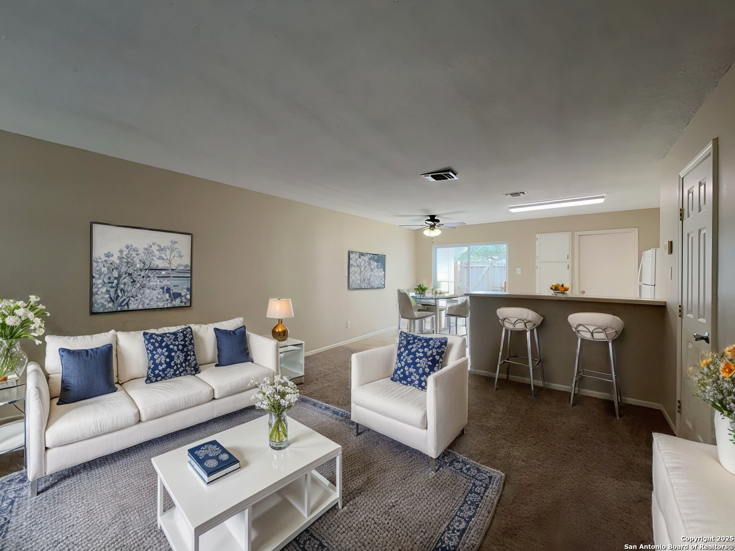 309 West Highland Drive Boerne, TX 78006 - Photo 2 of 32 a living room with furniture and a table