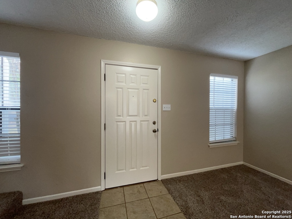 309 West Highland Drive Boerne, TX 78006 - Photo 24 of 32 an empty room with windows