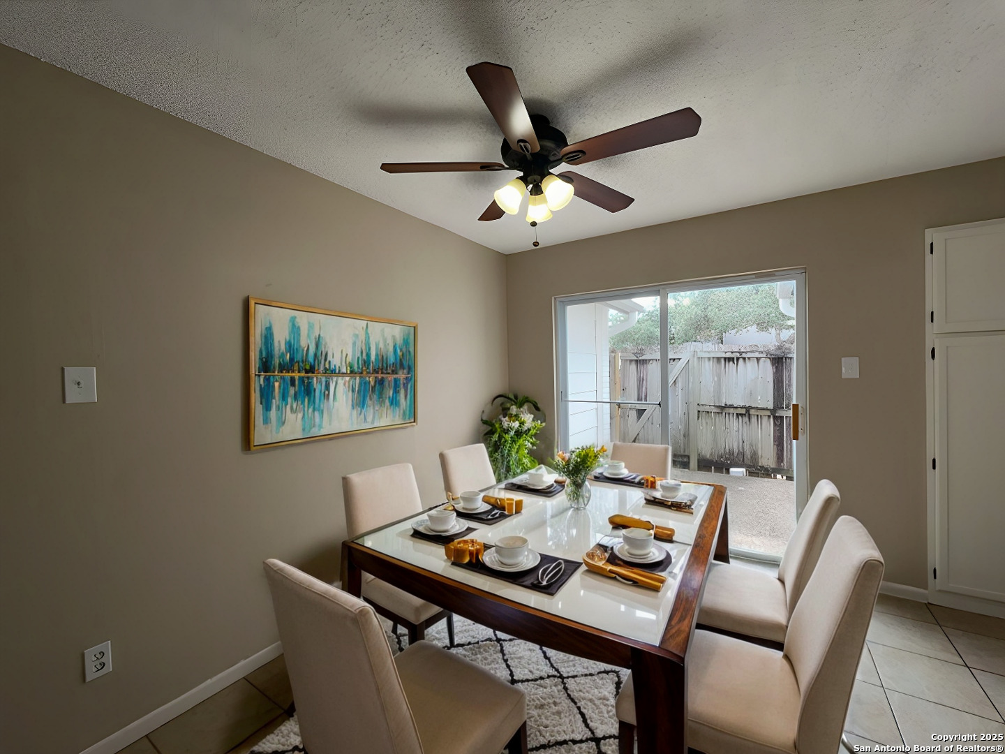 309 West Highland Drive Boerne, TX 78006 - Photo 3 of 32 a view of a dining room with a table and chairs