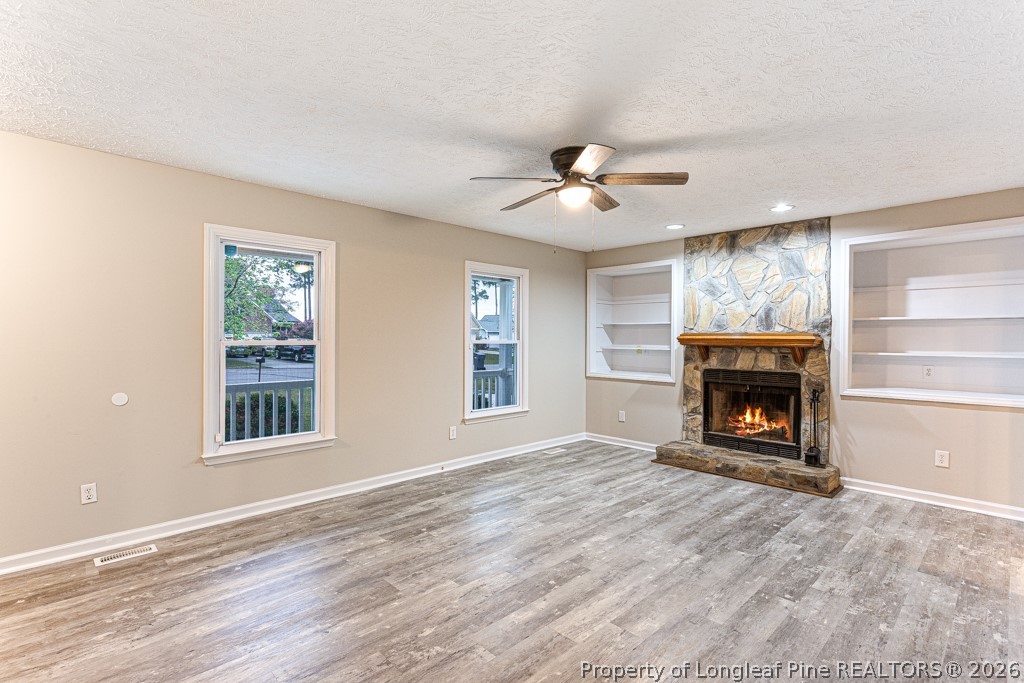 3533 Rittenour Drive Hope Mills, NC 28348 - Photo 15 of 33 a view of an empty room with window and fire place