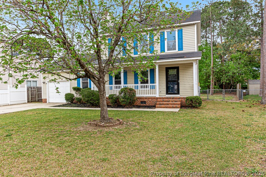 3533 Rittenour Drive Hope Mills, NC 28348 - Photo 3 of 33 a house that has a big yard in front of it
