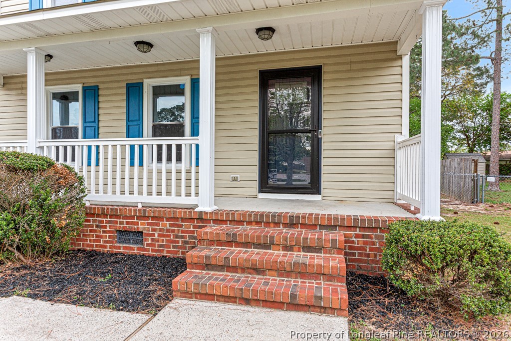 3533 Rittenour Drive Hope Mills, NC 28348 - Photo 4 of 33 a view of a house with wooden fence