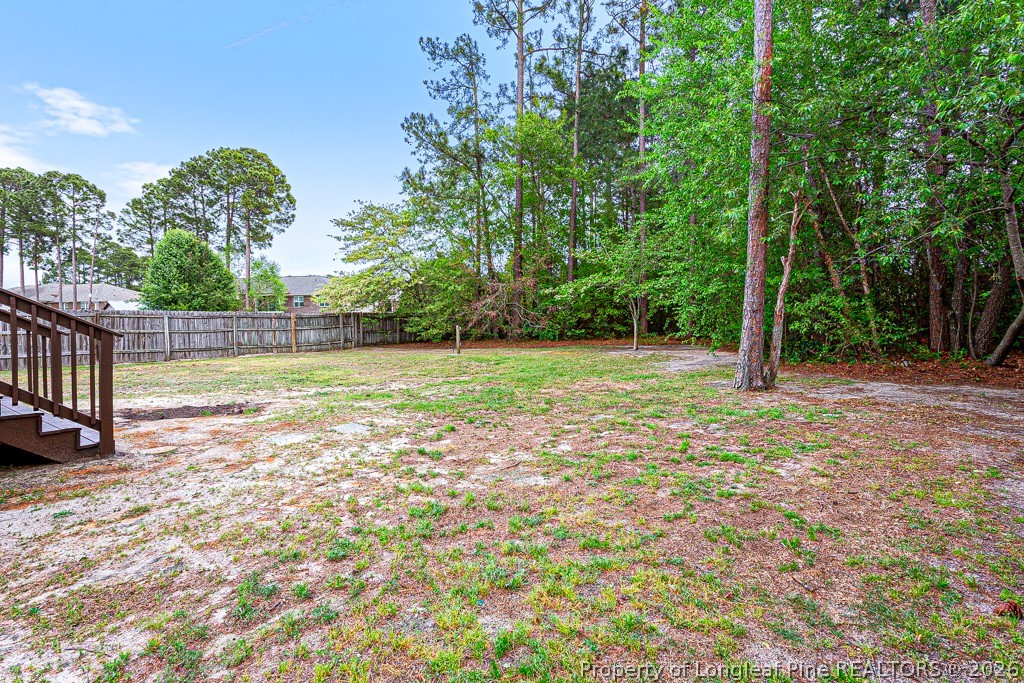 3533 Rittenour Drive Hope Mills, NC 28348 - Photo 5 of 33 a view of a swimming pool with an outdoor space and seating area