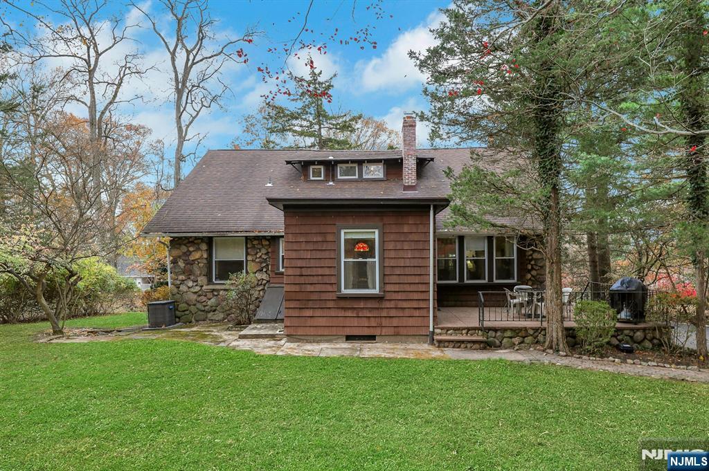 99 Armour Road Mahwah, NJ 07430 - Photo 26 of 27 a front view of a house with a garden