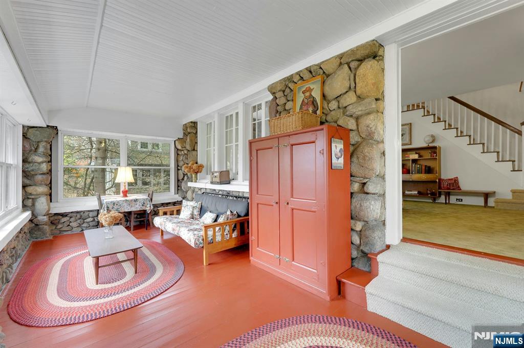 99 Armour Road Mahwah, NJ 07430 - Photo 5 of 27 a living room with furniture and a wooden floor