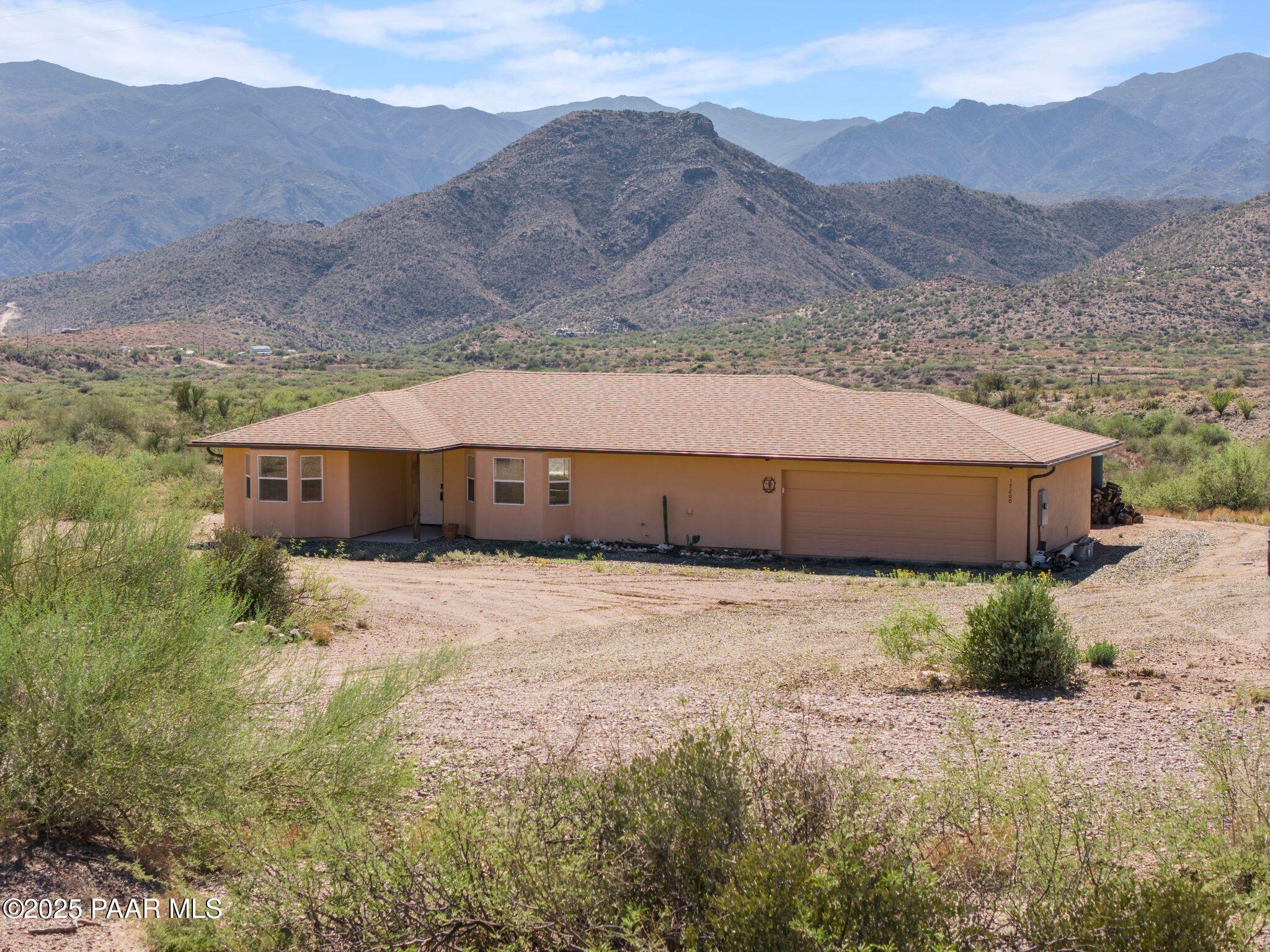 17200 South Dripping Springs Road Mayer, AZ 86333 - Photo 1 of 51 a view of a house with a mountain