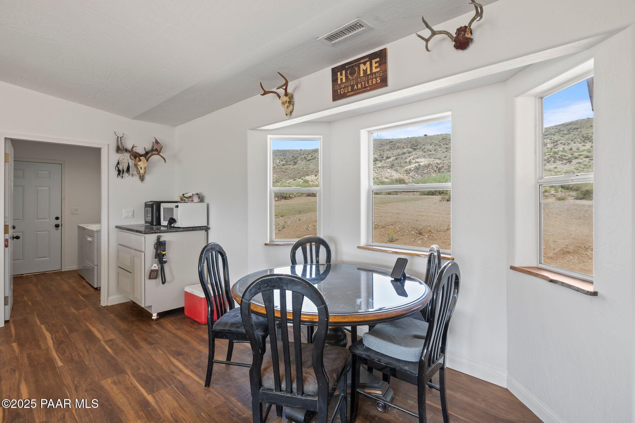 17200 South Dripping Springs Road Mayer, AZ 86333 - Photo 11 of 51 a dining room with furniture and window