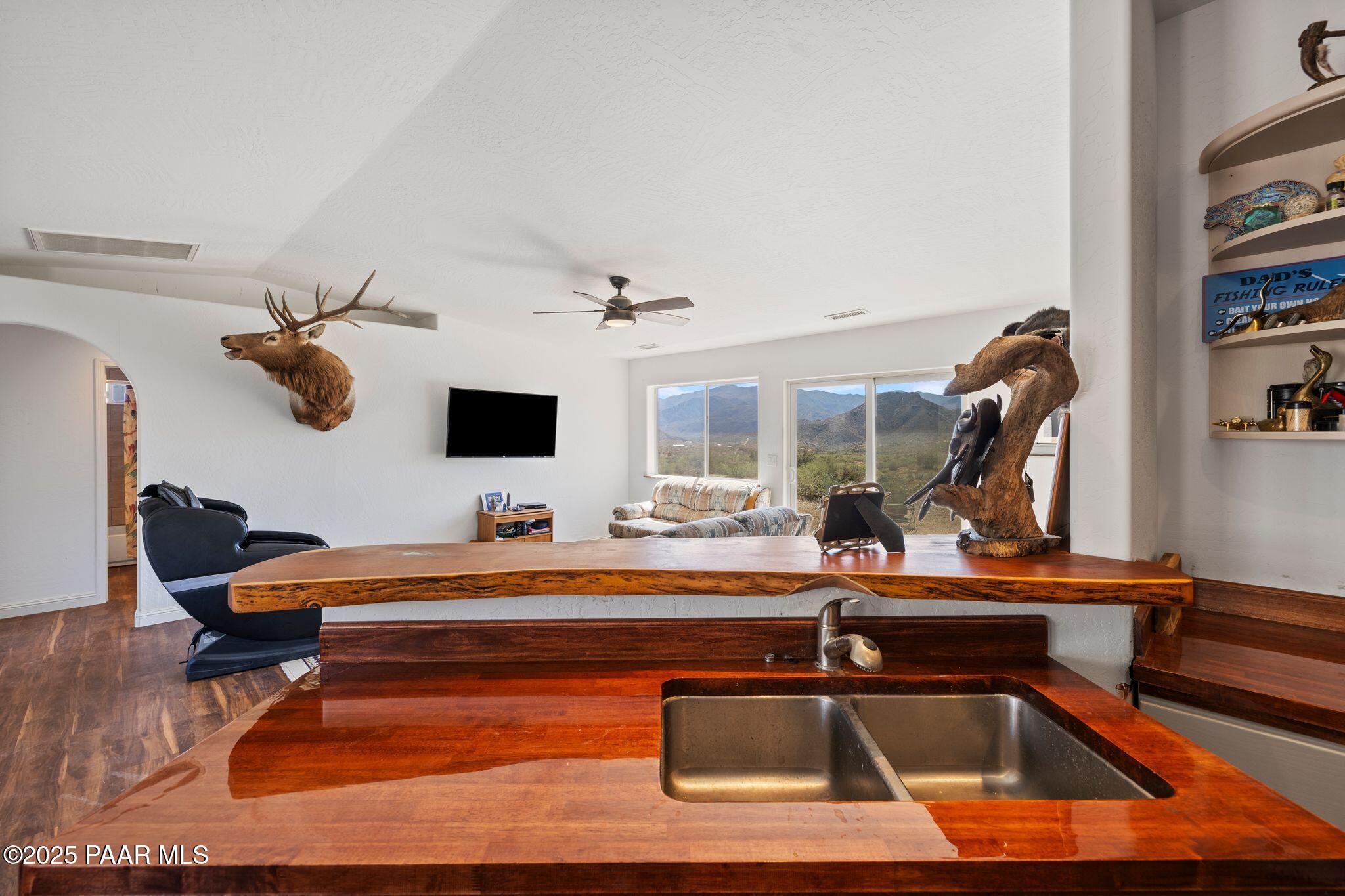 17200 South Dripping Springs Road Mayer, AZ 86333 - Photo 16 of 51 a room with furniture and wooden floor