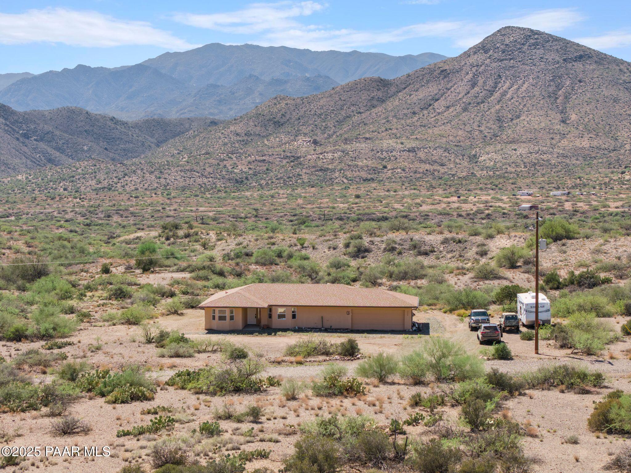 17200 South Dripping Springs Road Mayer, AZ 86333 - Photo 39 of 51 a view of a dry field with mountains in the background