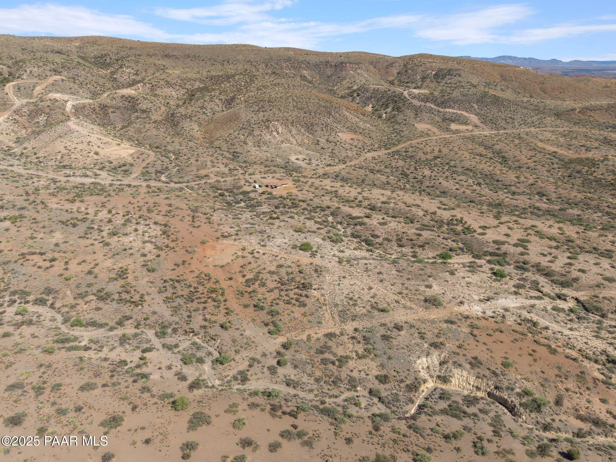 17200 South Dripping Springs Road Mayer, AZ 86333 - Photo 43 of 51 a view of a dry yard with mountains and green space
