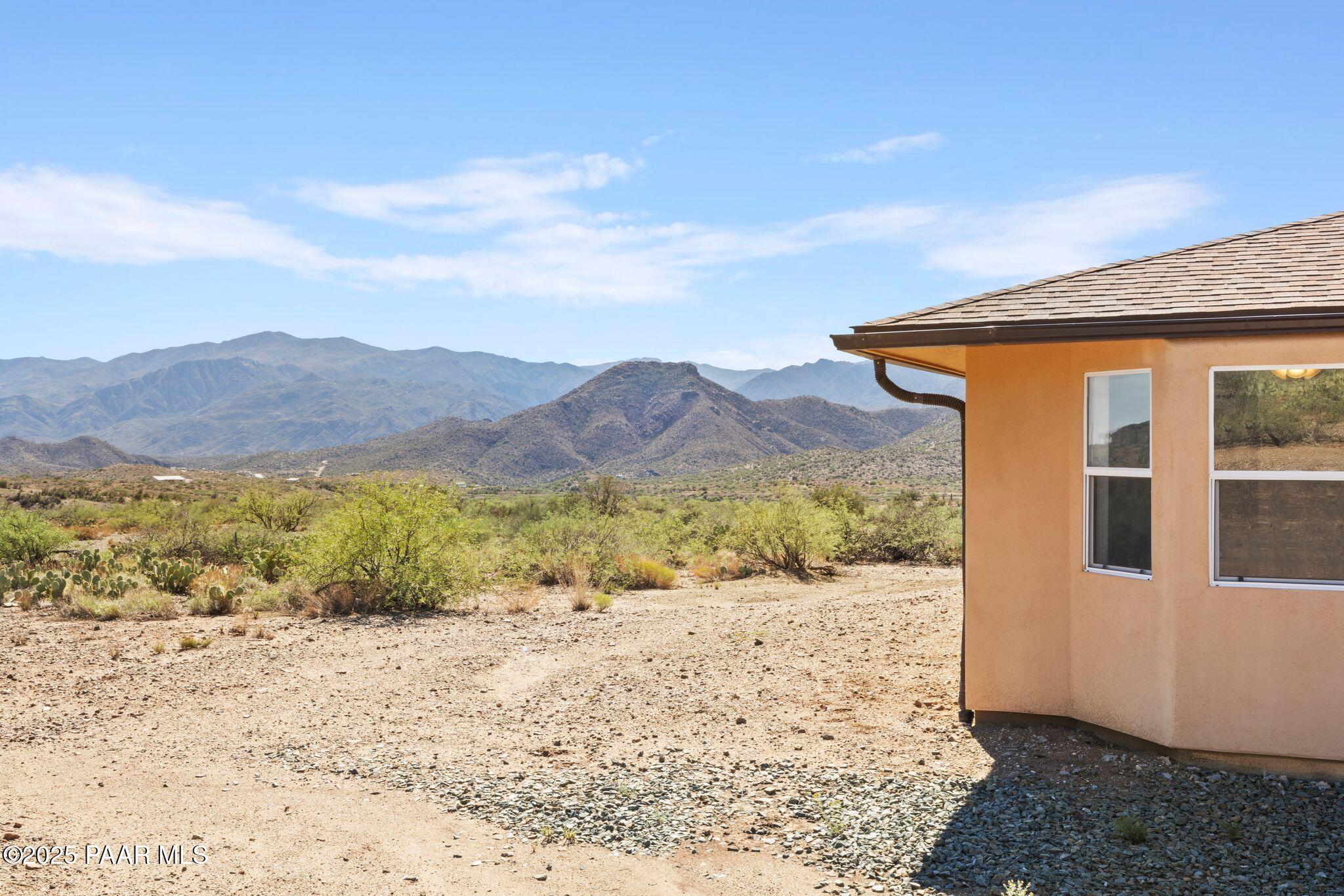 17200 South Dripping Springs Road Mayer, AZ 86333 - Photo 5 of 51 a view of a yard with a mountain