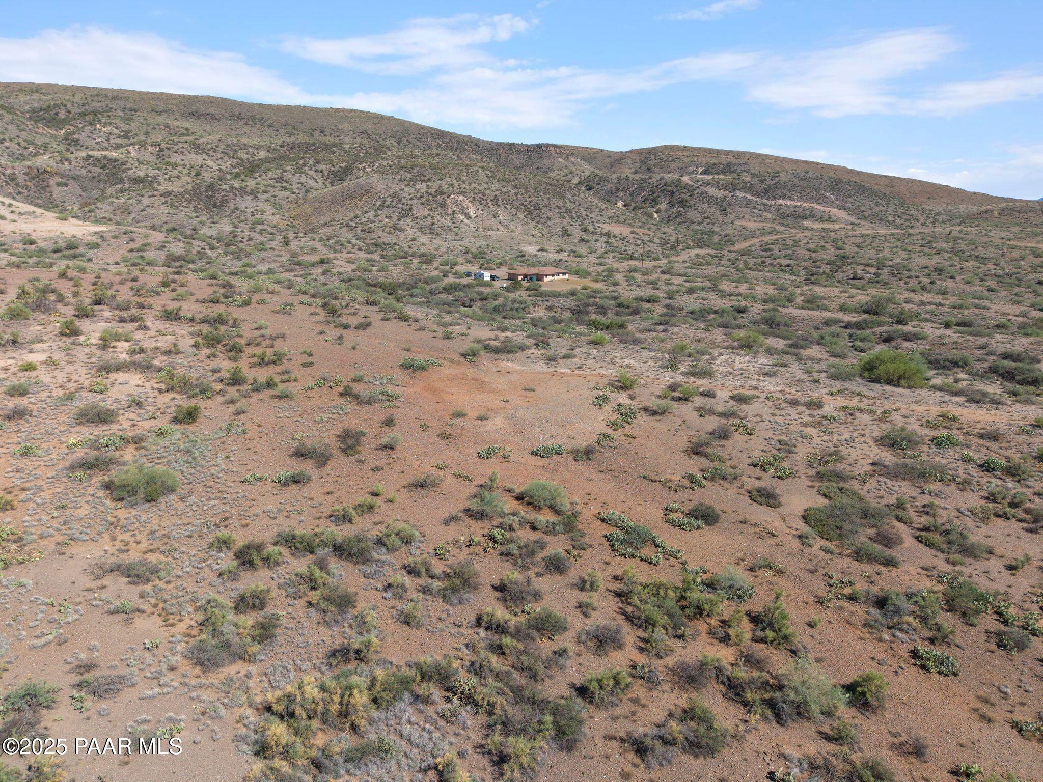 17200 South Dripping Springs Road Mayer, AZ 86333 - Photo 51 of 51 a view of a field with mountains in the background