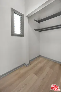 a view of a backyard with sitting area