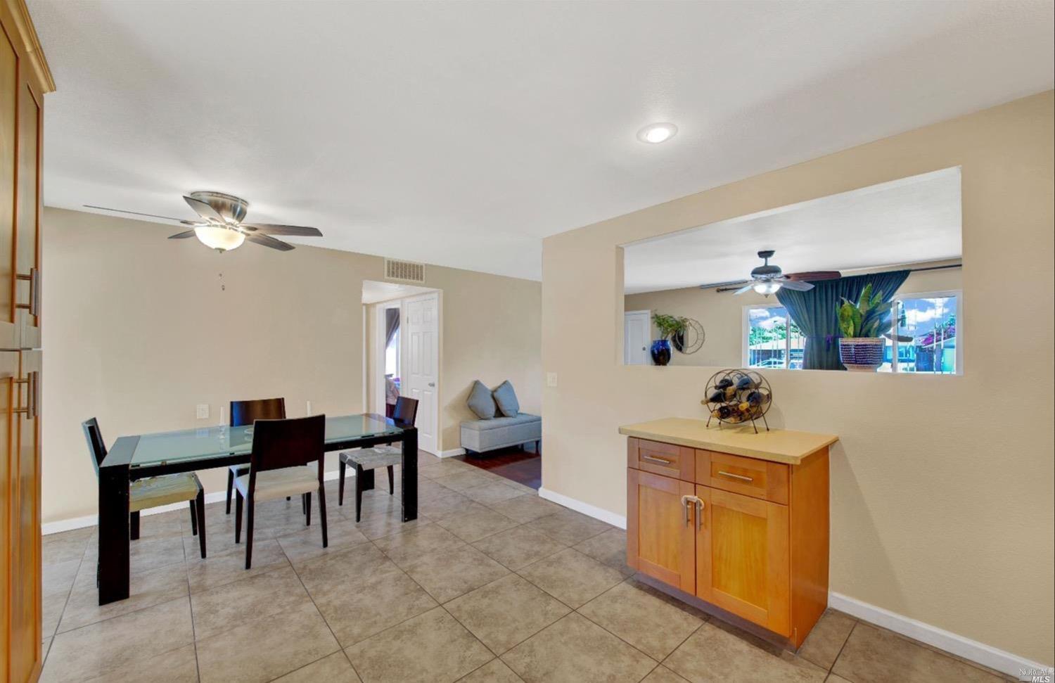 100 Arrowhead Court Vacaville, CA 95687 - Photo 14 of 40 a living room with furniture and a table