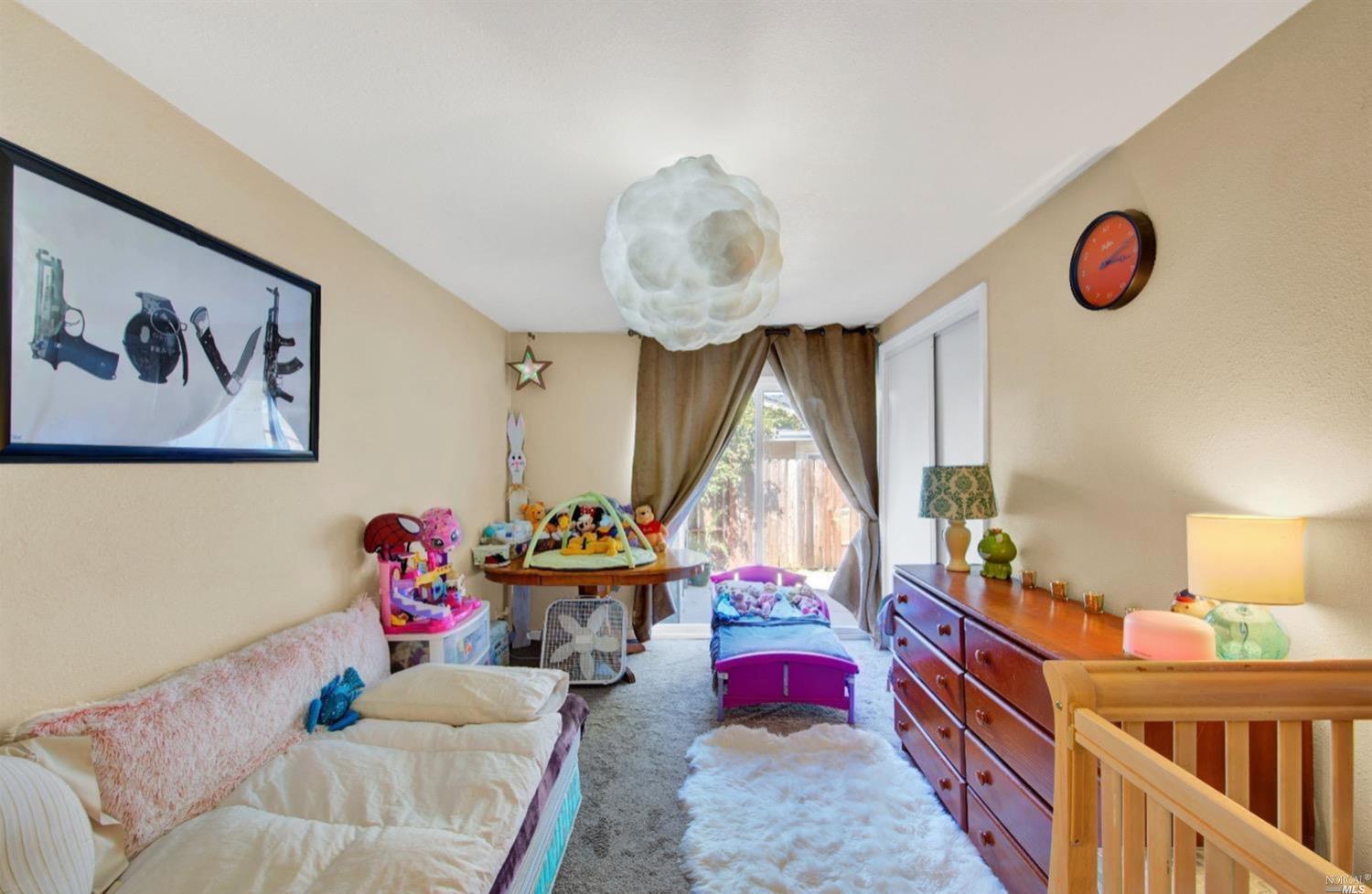 100 Arrowhead Court Vacaville, CA 95687 - Photo 20 of 40 a bedroom with furniture and a window