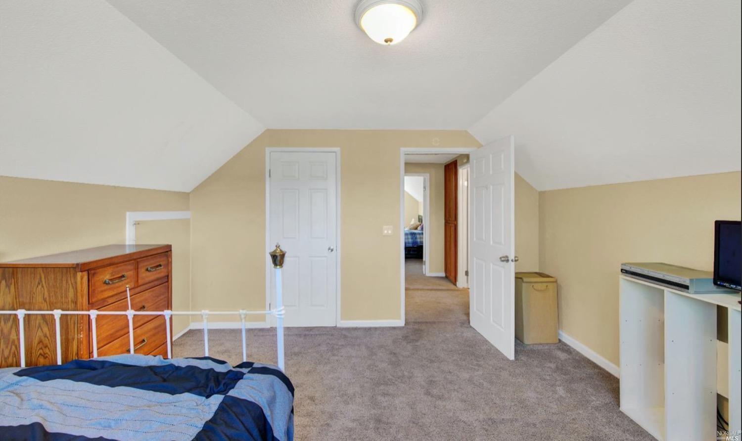 100 Arrowhead Court Vacaville, CA 95687 - Photo 22 of 40 a bedroom with furniture and a window