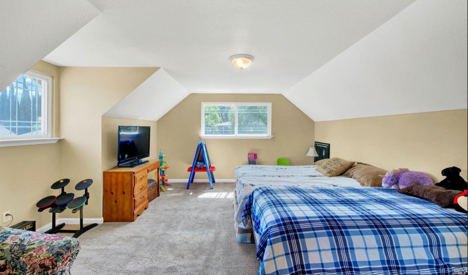 100 Arrowhead Court Vacaville, CA 95687 - Photo 24 of 40 a bedroom with a bed and window