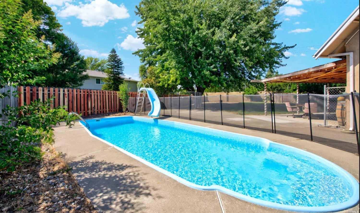 100 Arrowhead Court Vacaville, CA 95687 - Photo 36 of 40 a view of a backyard with a garden
