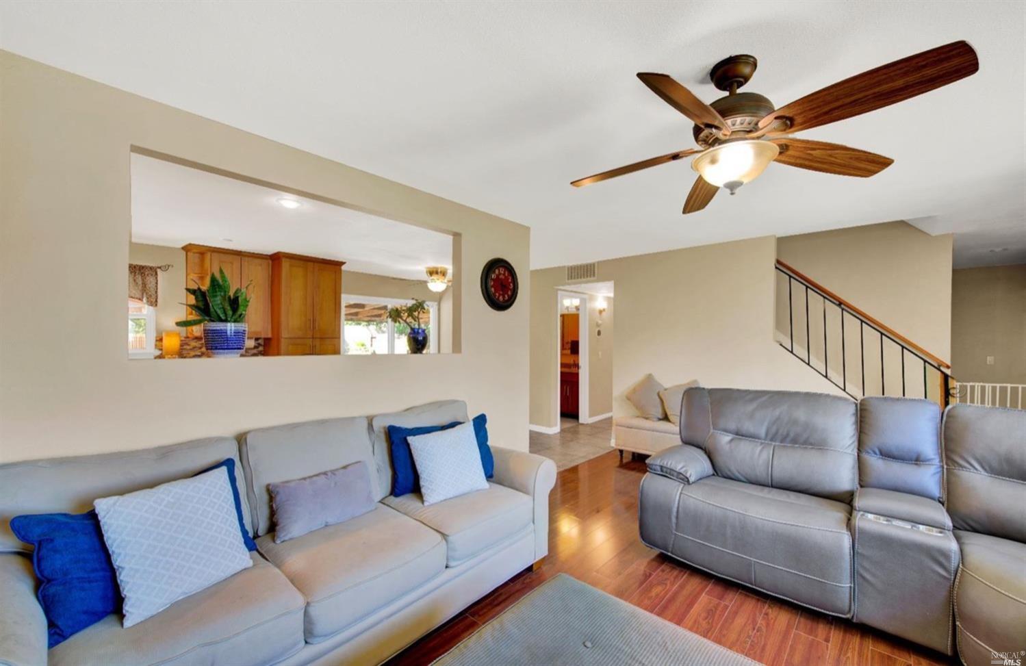 100 Arrowhead Court Vacaville, CA 95687 - Photo 8 of 40 a living room with furniture and a ceiling fan