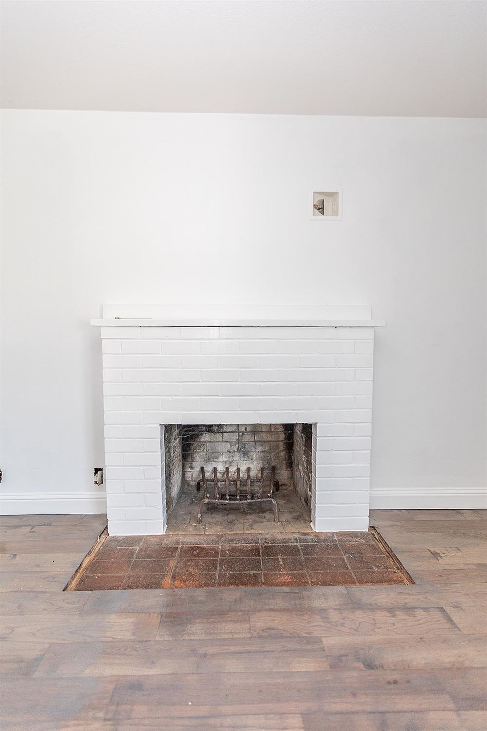 2105 Norman Way Modesto, CA 95350 - Photo 19 of 34 a living room with a fireplace