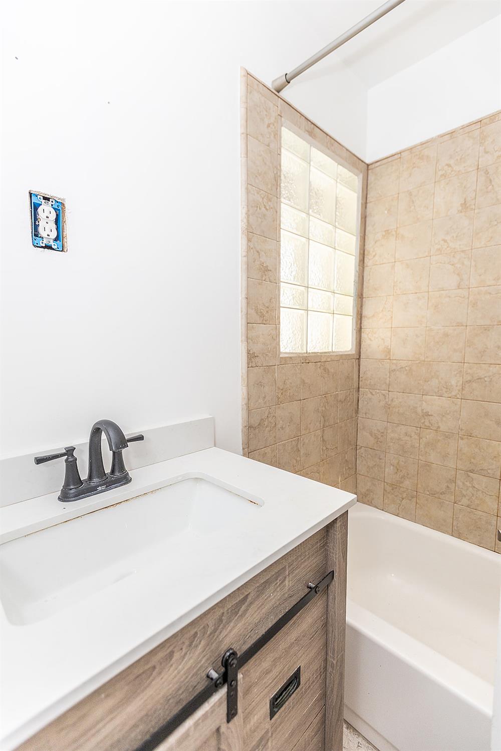 2105 Norman Way Modesto, CA 95350 - Photo 22 of 34 a bathroom with a sink and a bathtub
