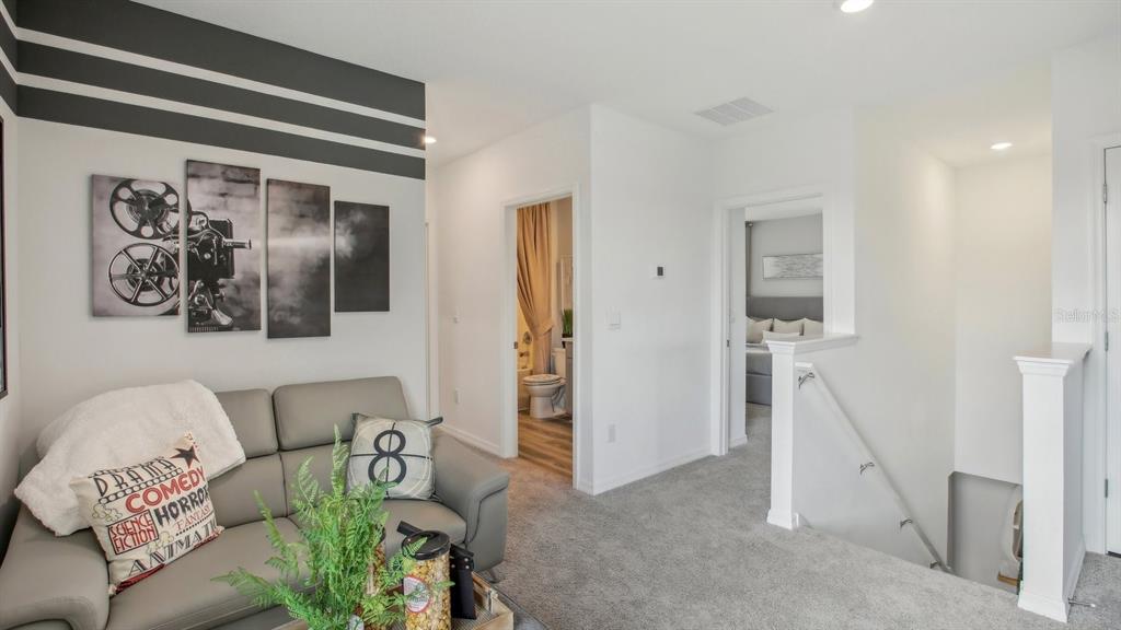 35293 Vly Rdg Road Dade City, FL 33525 - Photo 18 of 36 a living room with furniture and a window