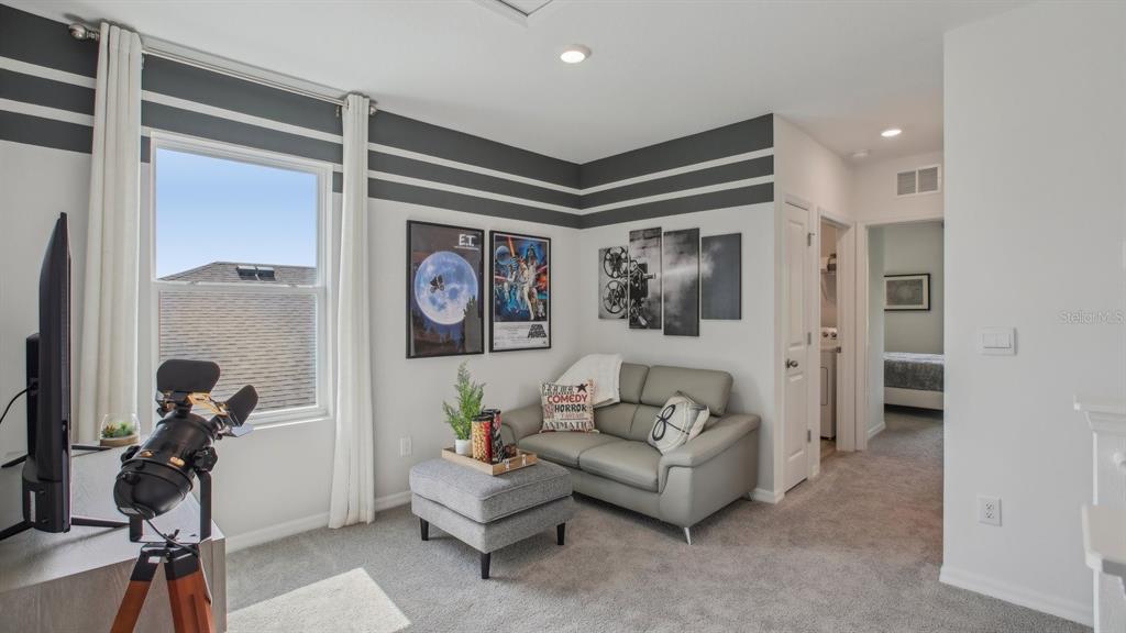 35293 Vly Rdg Road Dade City, FL 33525 - Photo 21 of 36 a living room with furniture and a window