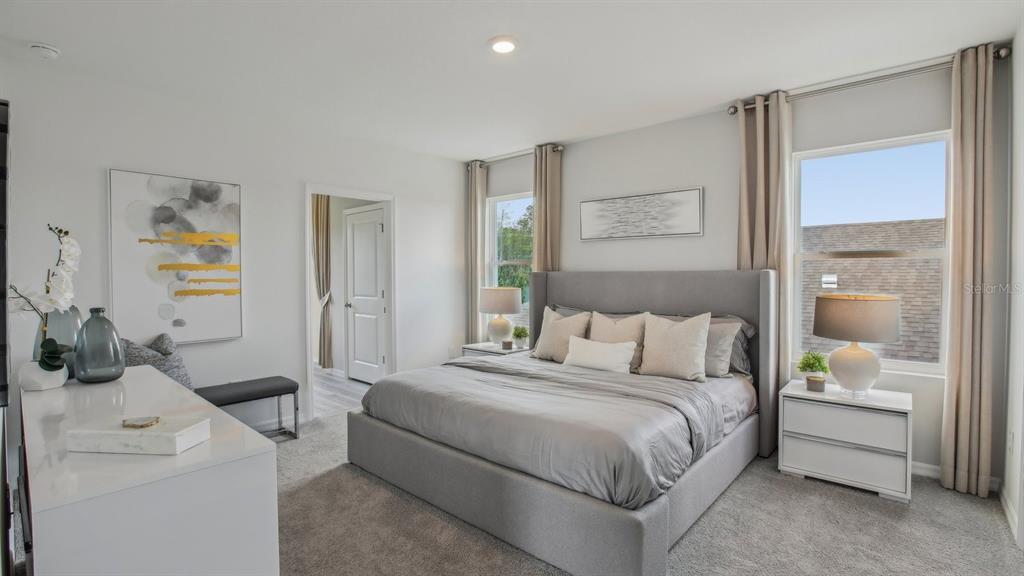 35293 Vly Rdg Road Dade City, FL 33525 - Photo 25 of 36 a bedroom with a bed and a cabinets