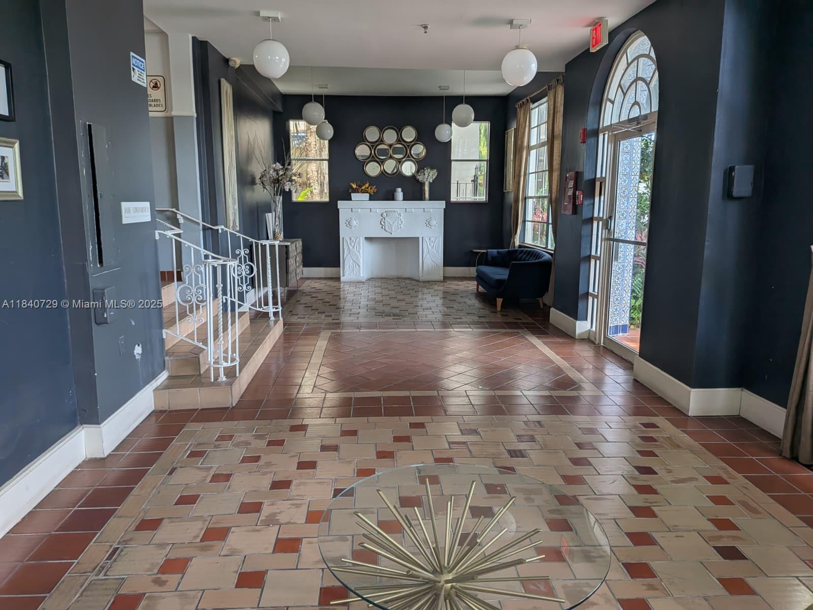 1008 Jefferson Avenue, Unit 202 Miami Beach, FL 33139 - Photo 2 of 16 a view of lobby with window and furniture