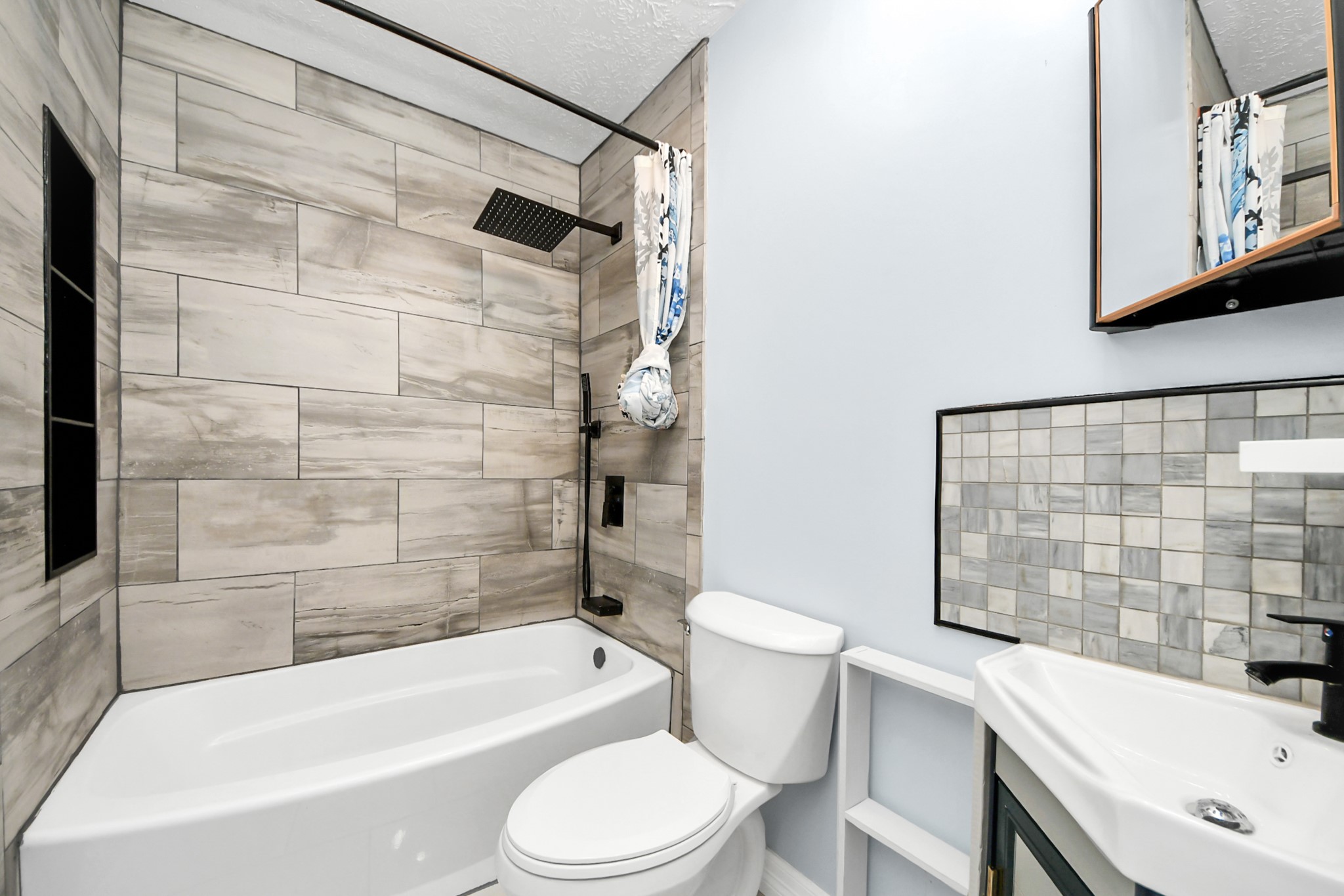 28707 Stapleford Street Spring, TX 77386 - Photo 31 of 38 a bathroom with a sink and a bathtub