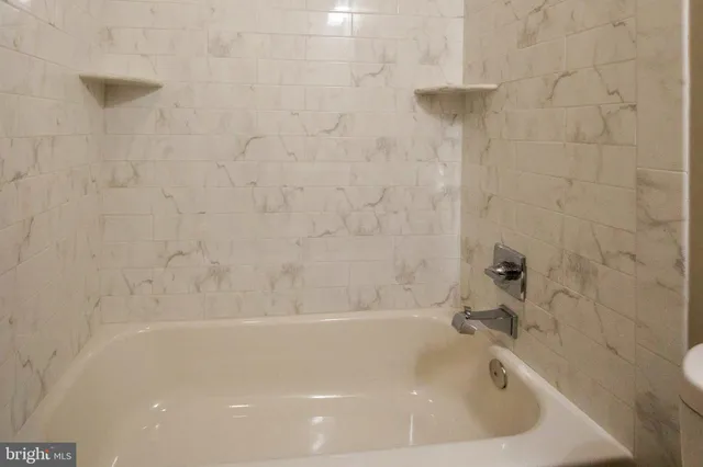 a bathroom with a bathtub