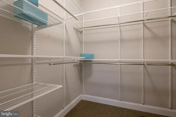 a view of a room with racks on the wall