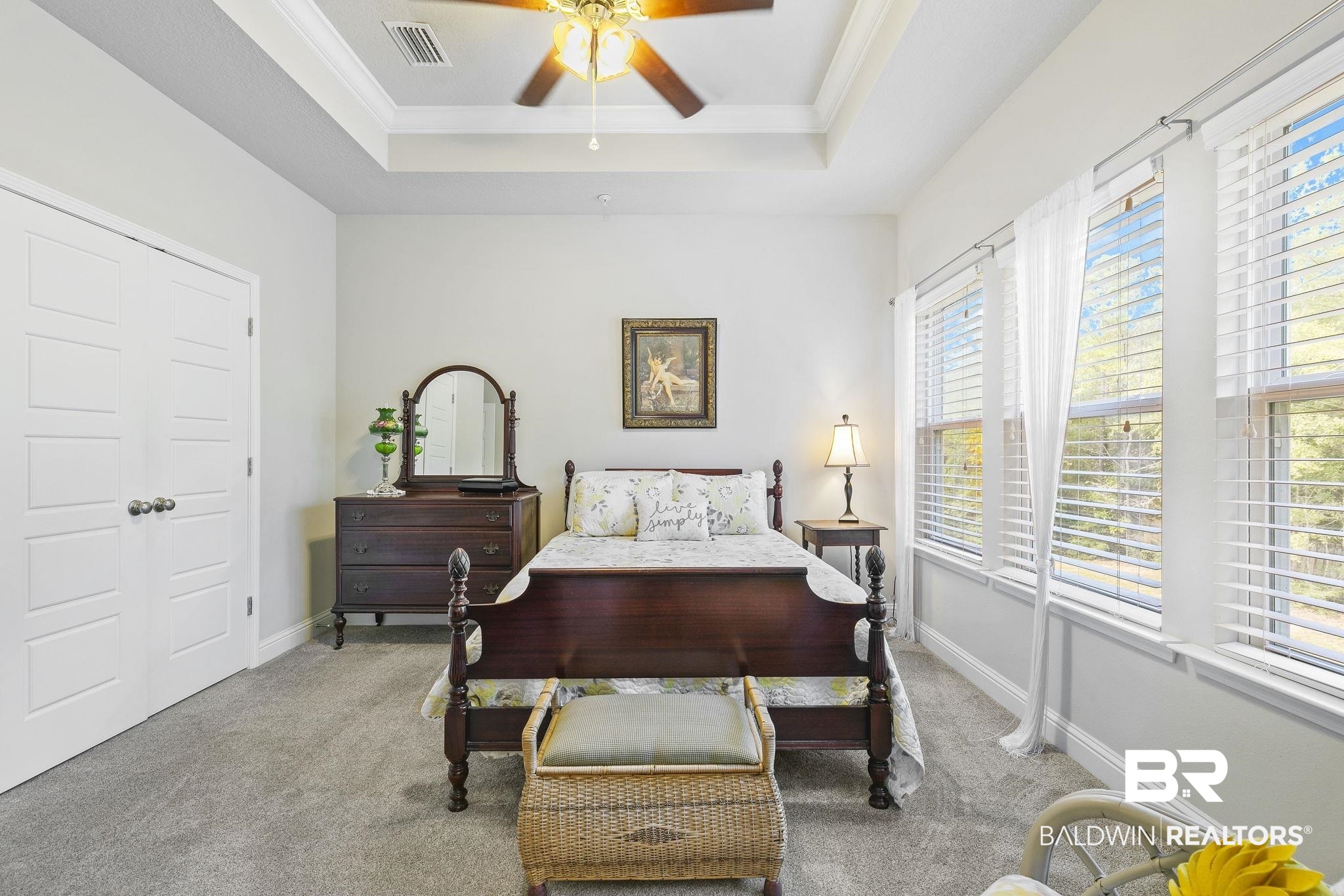 6867 Spaniel Drive, Unit B Daphne, AL 36527 - Photo 16 of 36 Bedroom with light carpet, multiple windows, crown molding, and ceiling fan
