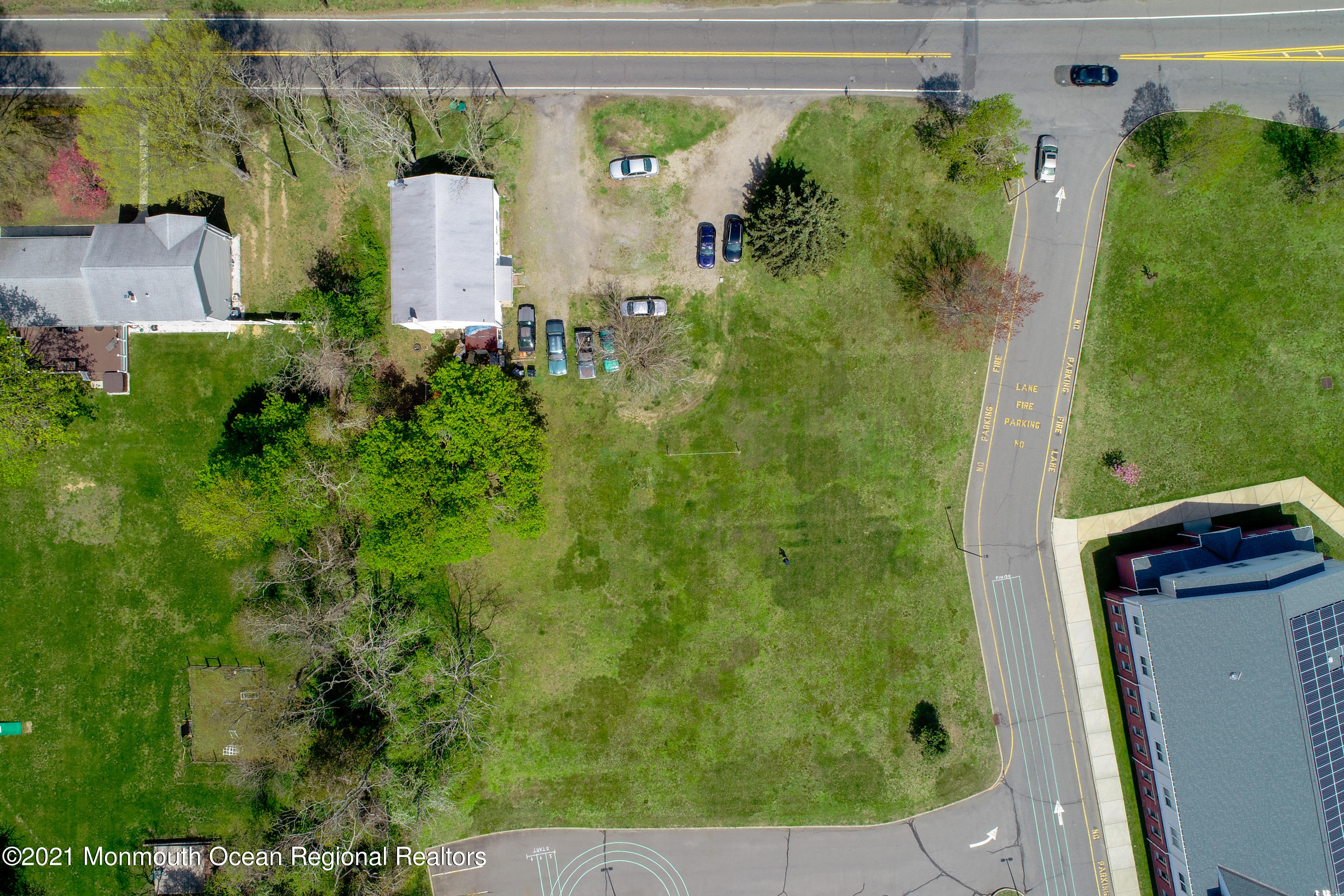 511 Squankum Yellowbrook Road Farmingdale, NJ 07727 - Photo 19 of 27 an aerial view of a house with a yard