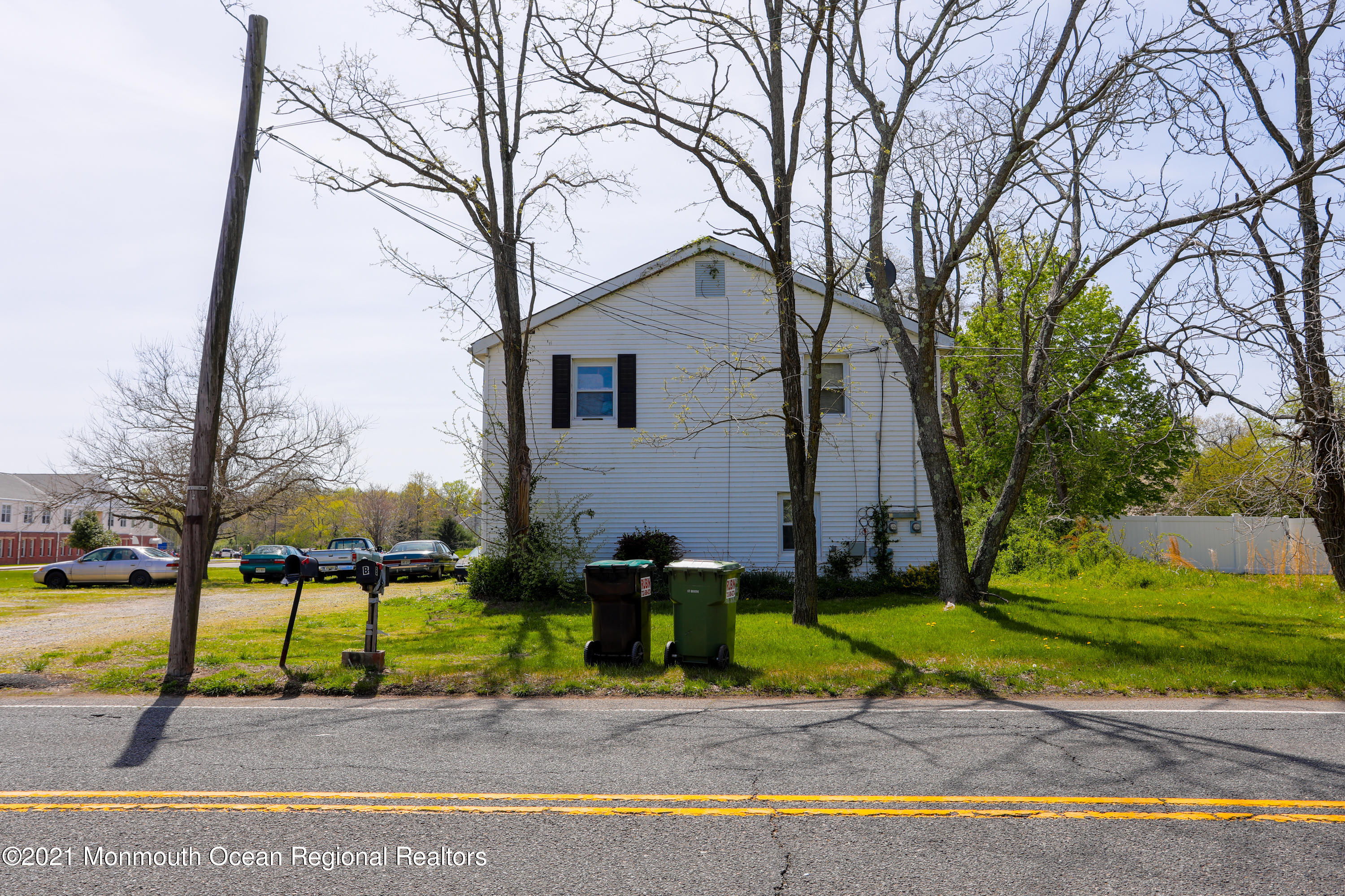 511 Squankum Yellowbrook Road Farmingdale, NJ 07727 - Photo 27 of 27 a view of a house with a yard