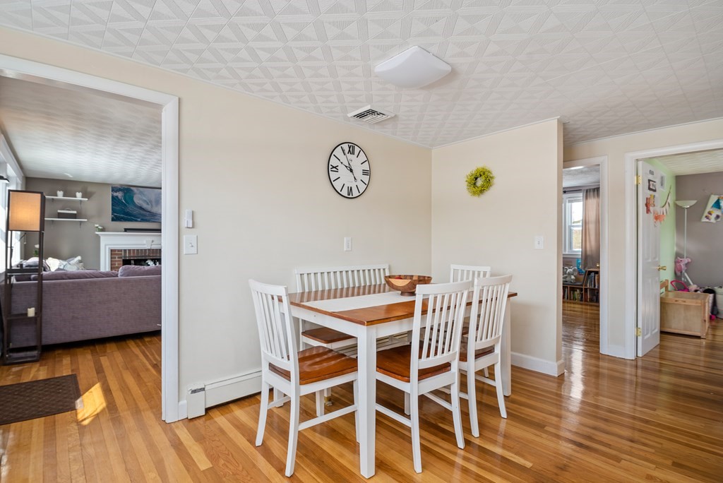 3 Athens Drive Saugus, MA 01906 - Photo 12 of 36 a view of a dining room with furniture and wooden floor