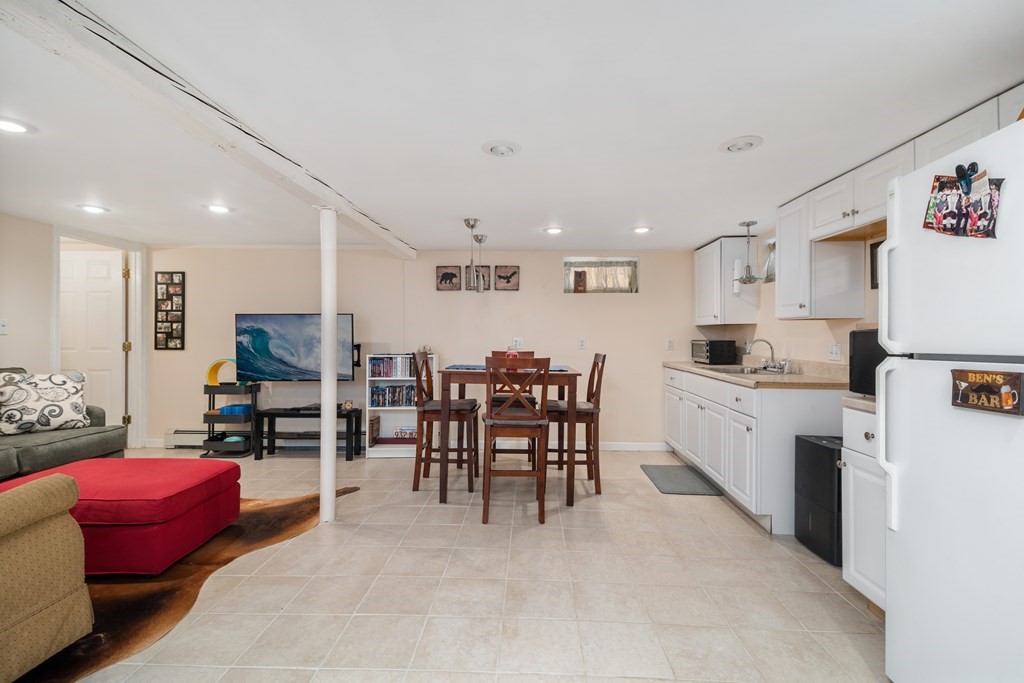 3 Athens Drive Saugus, MA 01906 - Photo 23 of 36 a kitchen with furniture and appliances
