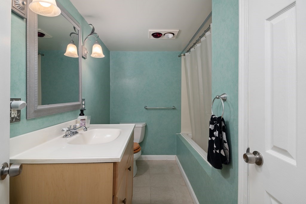 3 Athens Drive Saugus, MA 01906 - Photo 30 of 36 a bathroom with a sink and a mirror