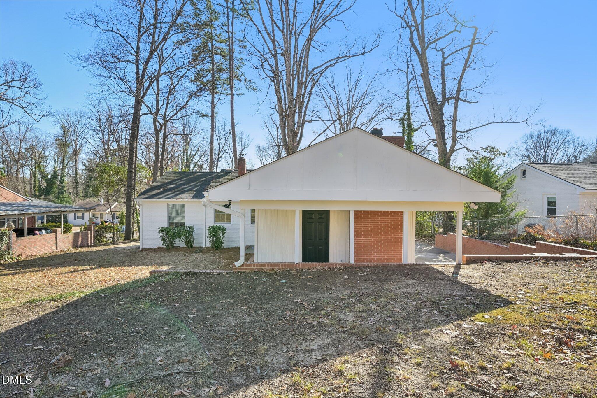 2343 Derby Drive Raleigh, NC 27610 - Photo 32 of 38 front view of a house with a yard