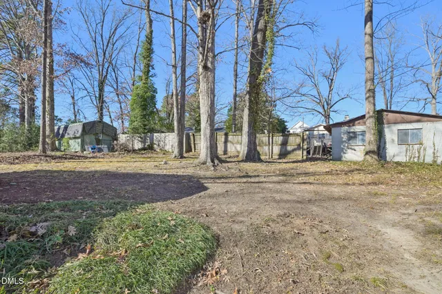 a view of a yard in front of a house