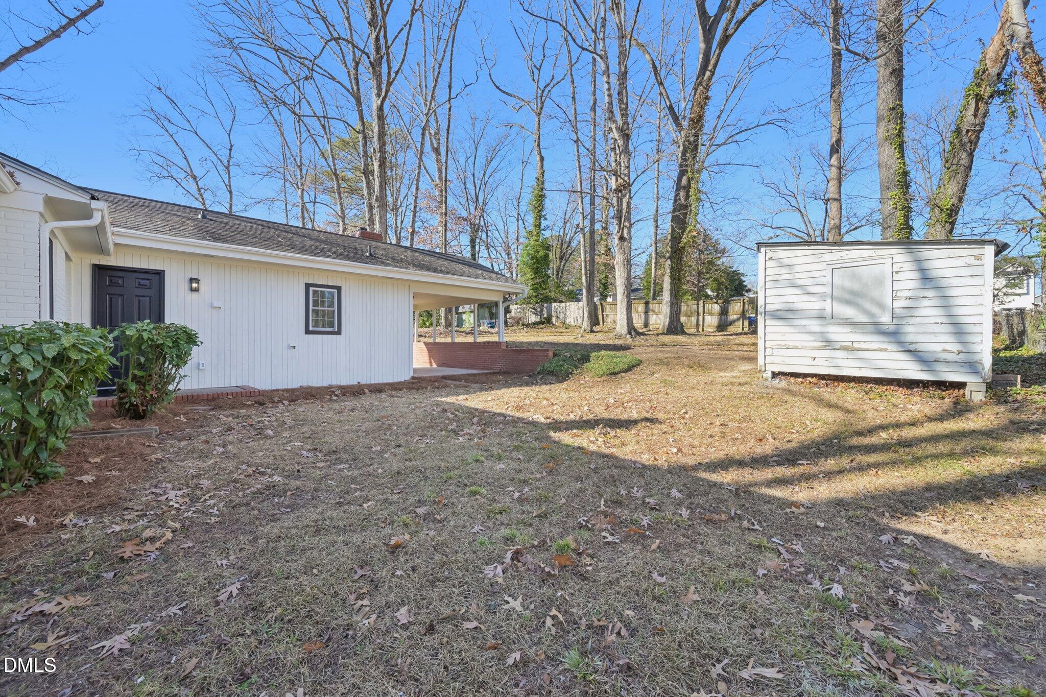 2343 Derby Drive Raleigh, NC 27610 - Photo 36 of 38 a view of a house with a snow in the yard