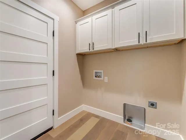 a view of a closet with cabinet