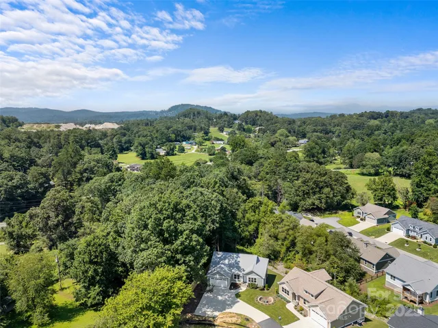 an aerial view of a city with lots of residential buildings