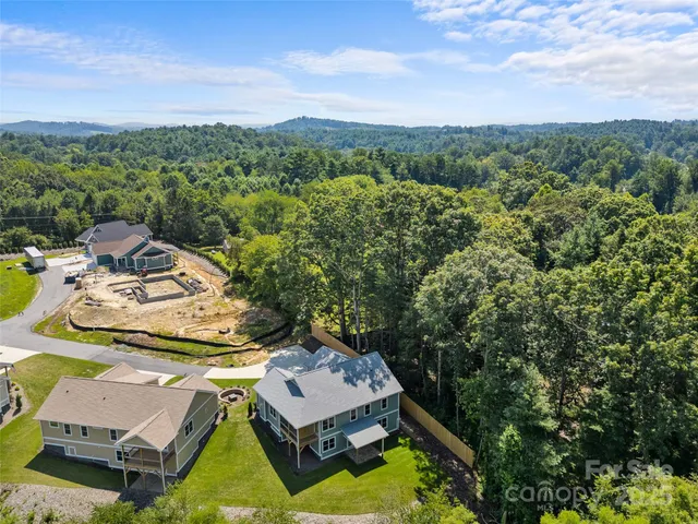 a view of a patio in a backyard