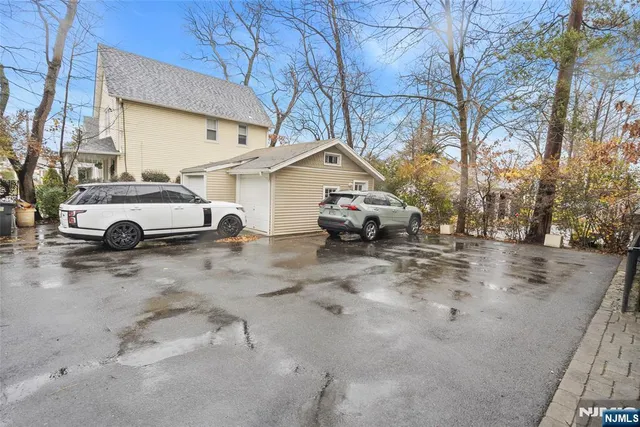 a car parked in front of a house