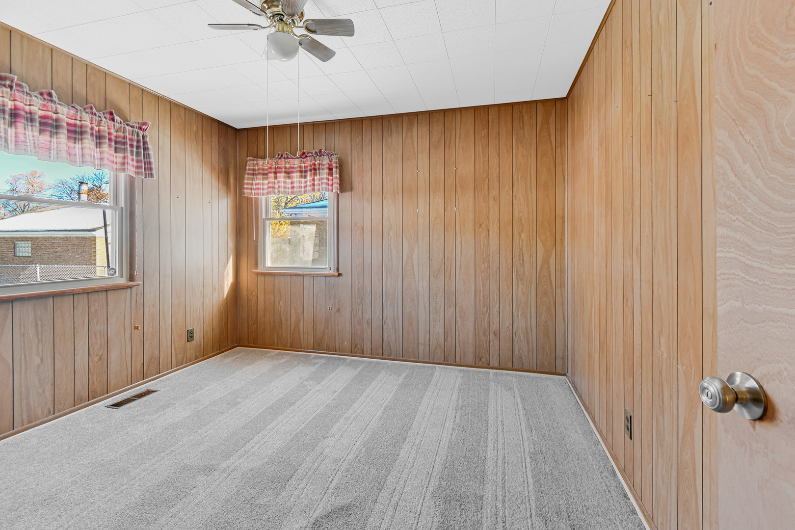 3346 Bernice Road Lansing, IL 60438 - Photo 13 of 24 wooden floor in an empty room with a window