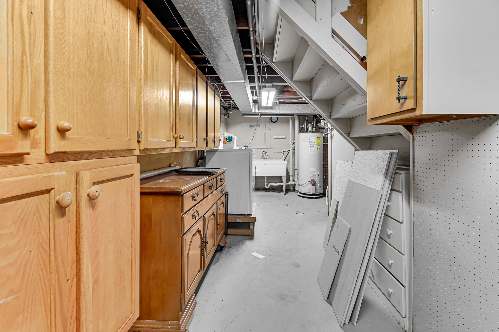 3346 Bernice Road Lansing, IL 60438 - Photo 18 of 24 a kitchen with a sink stainless steel appliances a refrigerator and a stove