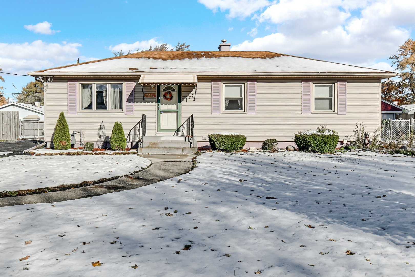 3346 Bernice Road Lansing, IL 60438 - Photo 2 of 24 a view of a white house with a yard